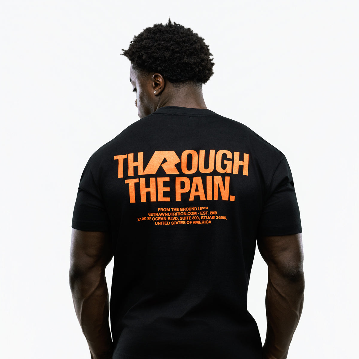 RAW Core Through The Pain T-Shirt, black and orange, on model, back (men's)