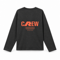 Black long sleeve t-shirt with orange CREW and mission statement on the back