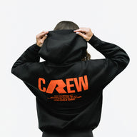 RAW Core Crew Hoodie, black and orange, on model, back (women's)
