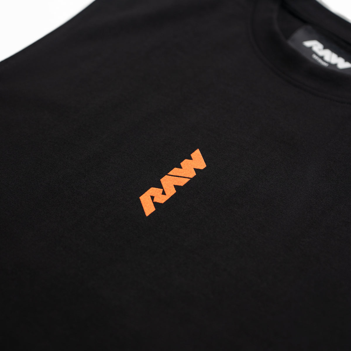 RAW Core Crew Tank, black and orange, chest logo detail