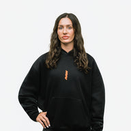 RAW Core Through The Pain Hoodie, black and orange, on model, front (women's)