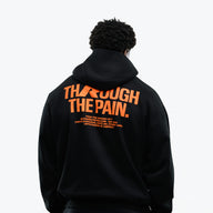 RAW Core Through The Pain Hoodie, black and orange, on model, back (men's)