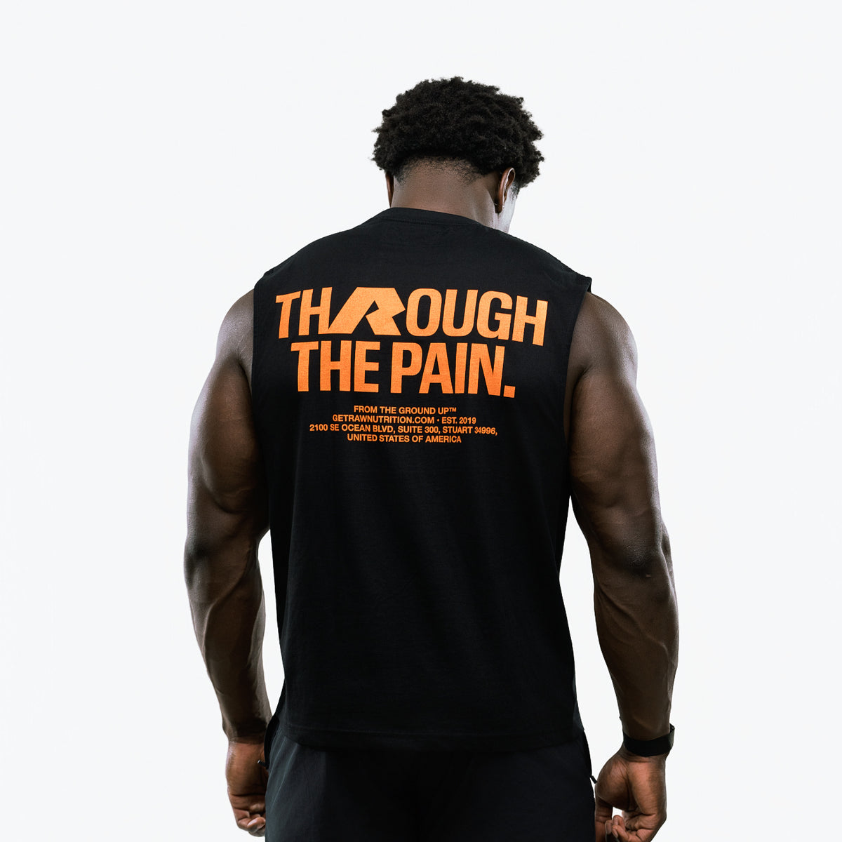 RAW Core Through The Pain Tank, black and orange, on model, back (men's)