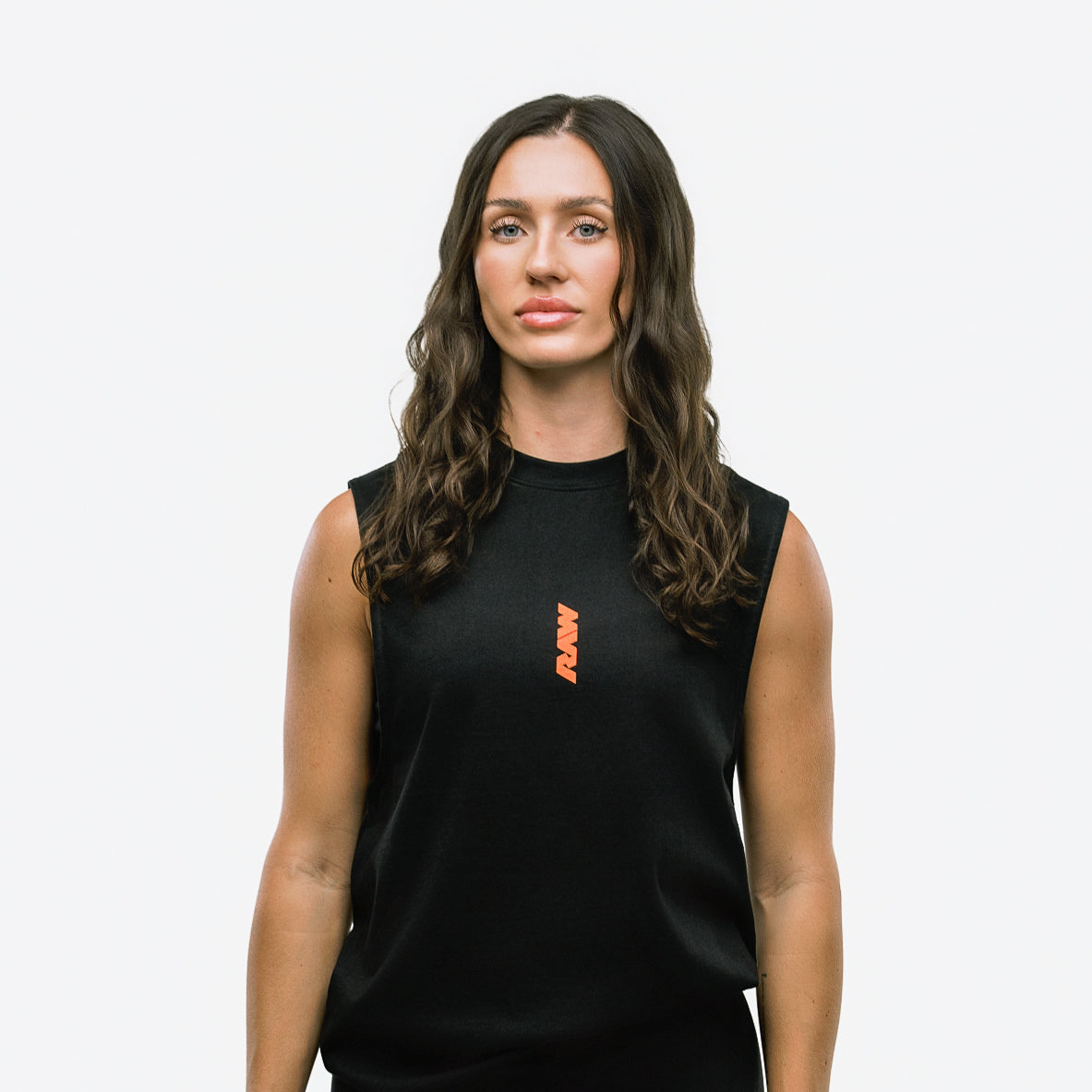 RAW Core Through The Pain Tank, black and orange, on model, front (women's)